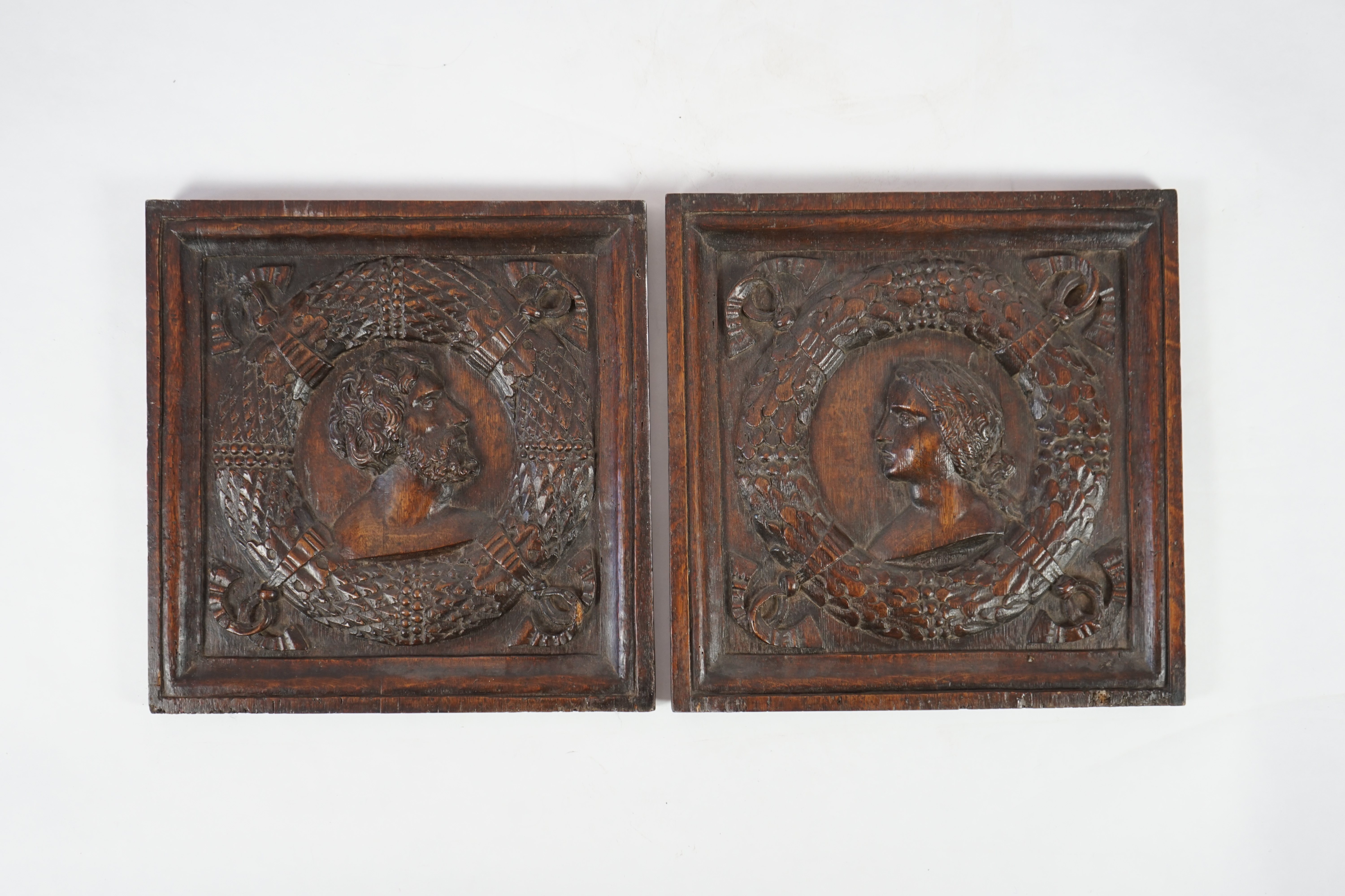 A pair of 17th century carved oak panels